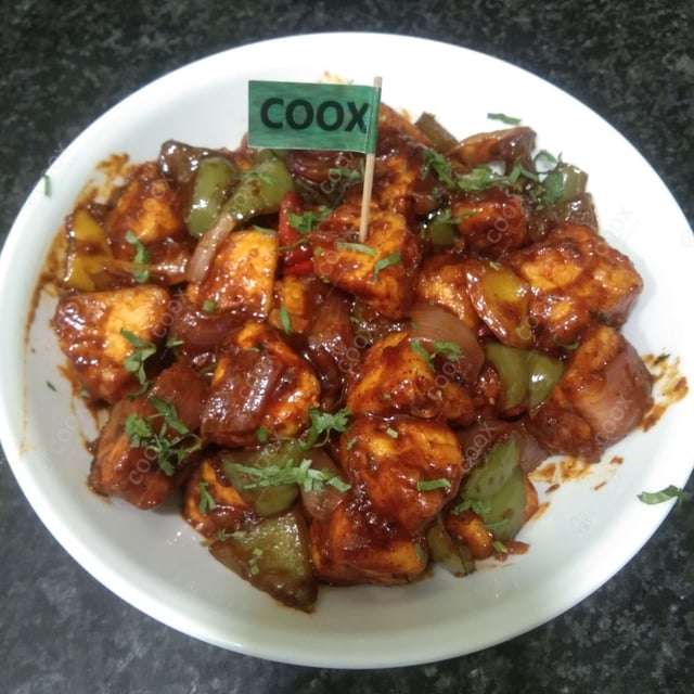 Delicious Chilly Paneer prepared by COOX