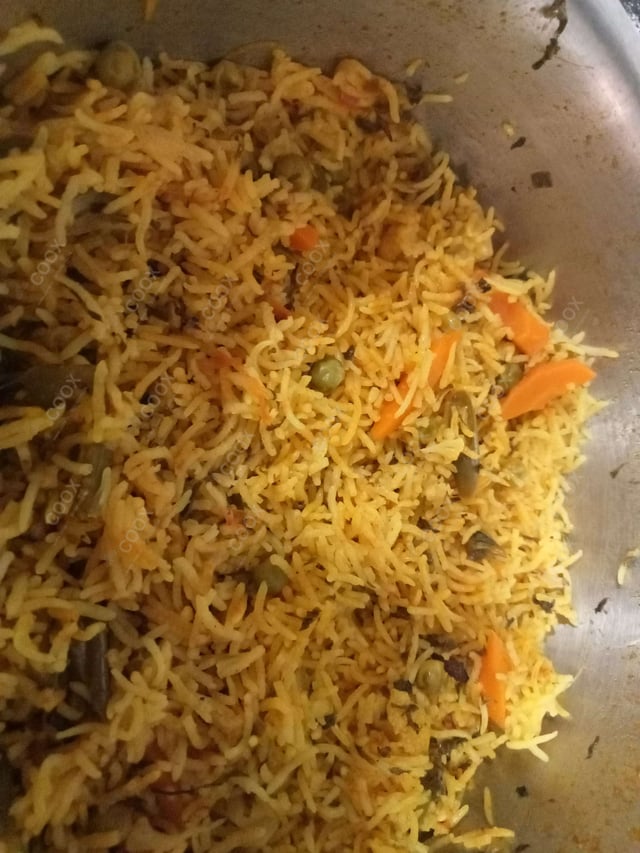 Delicious Veg Biryani prepared by COOX