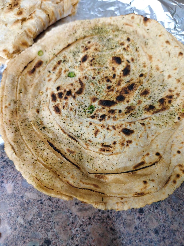 Delicious Lachha Paranthas prepared by COOX