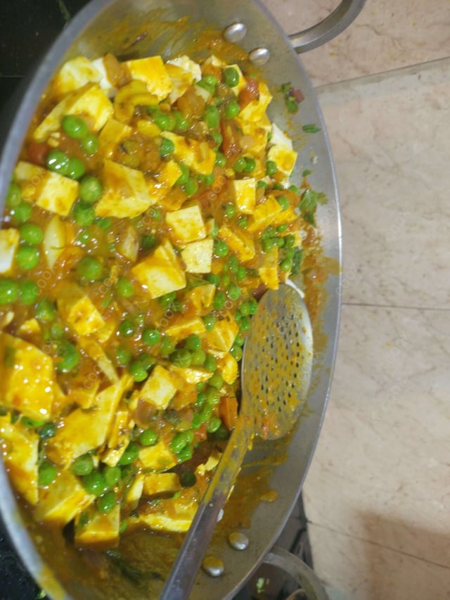 Delicious Matar Paneer prepared by COOX