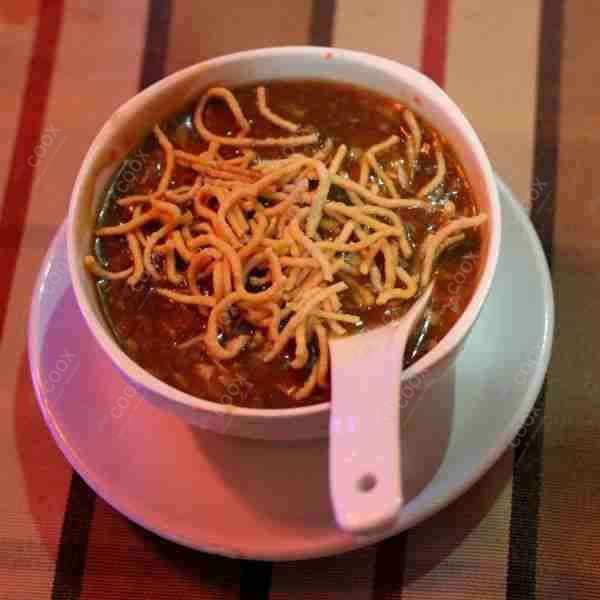 Delicious Vegetable Manchow Soup prepared by COOX