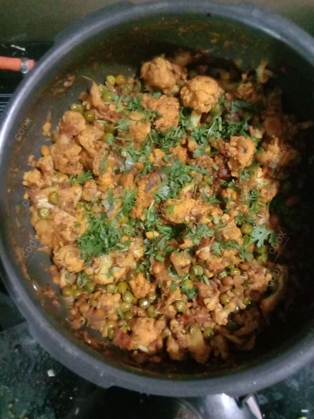 Delicious Gobhi Matar prepared by COOX