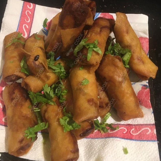 Delicious Veg Spring Rolls prepared by COOX