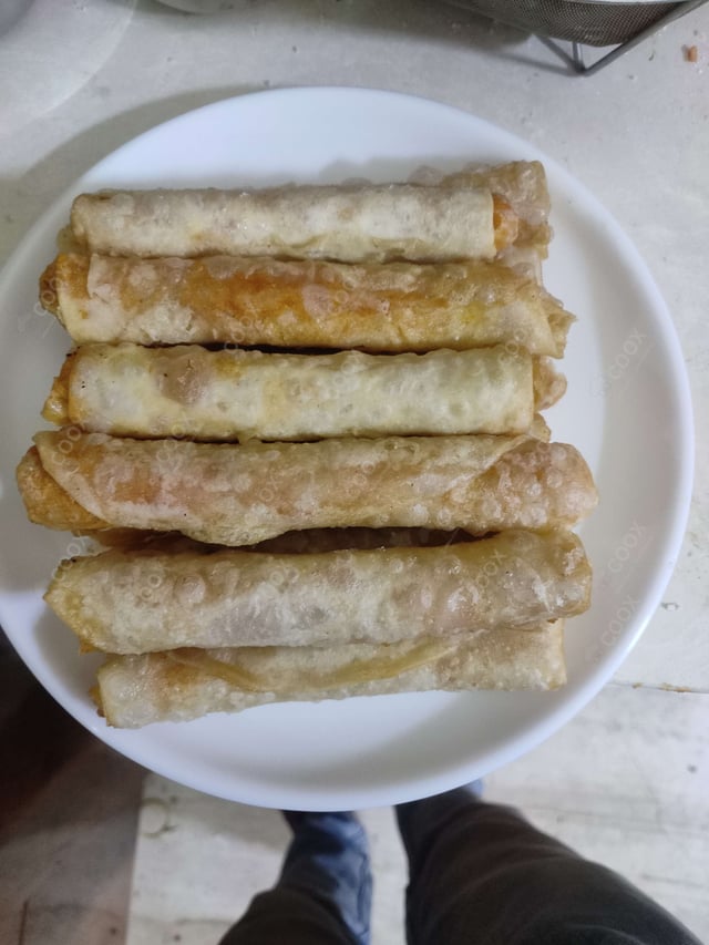 Delicious Veg Spring Rolls prepared by COOX