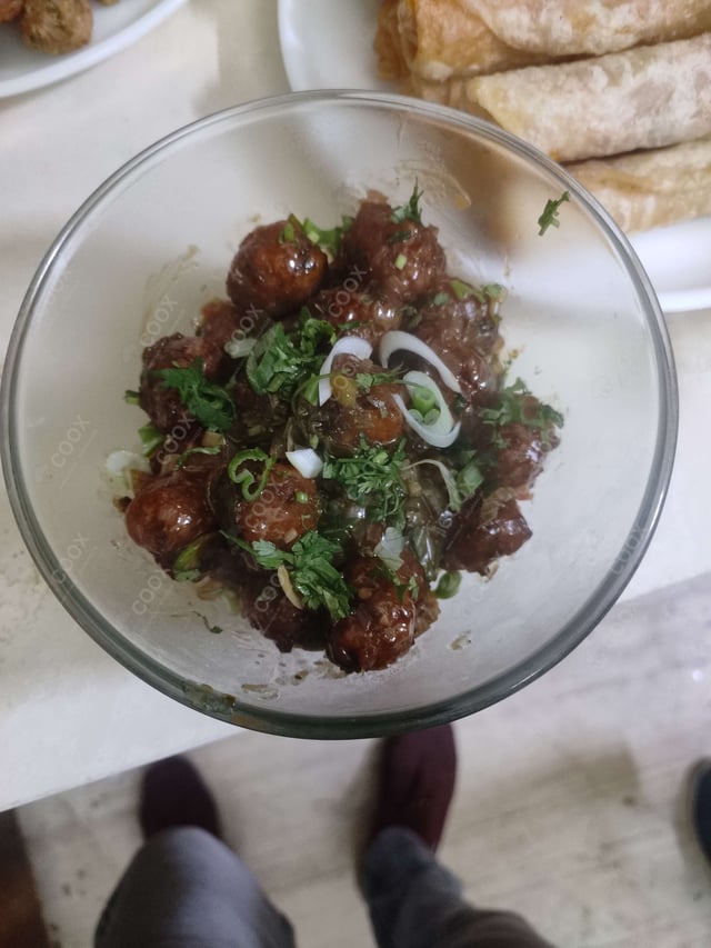 Delicious Veg Manchurian (Dry) prepared by COOX