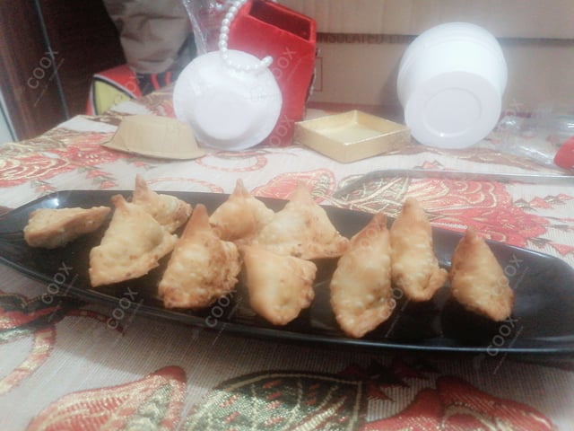 Delicious Mini Samosas prepared by COOX