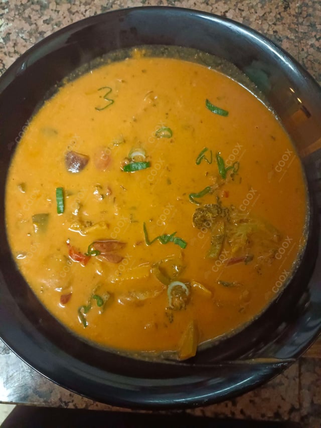 Delicious Red Thai Curry prepared by COOX