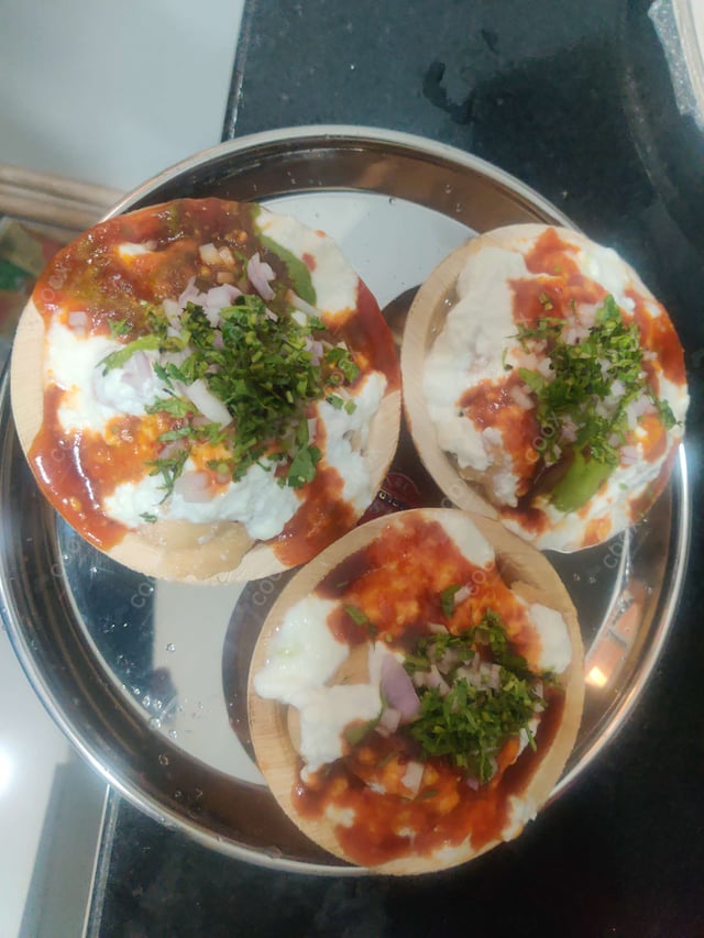 Delicious Dahi Bhalla prepared by COOX