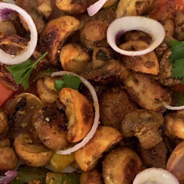 Delicious Mushroom Tikka prepared by COOX