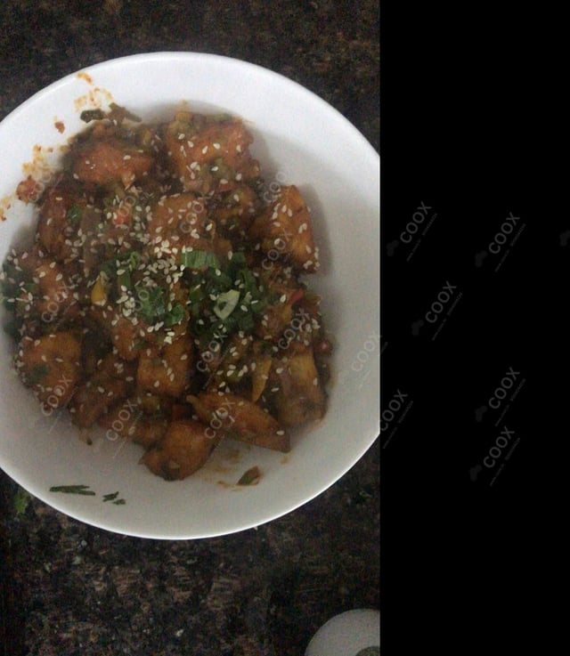 Delicious Chilly Paneer prepared by COOX