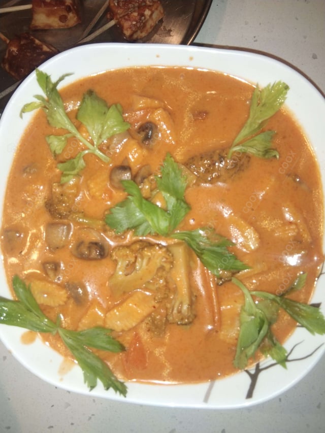 Delicious Red Thai Curry prepared by COOX