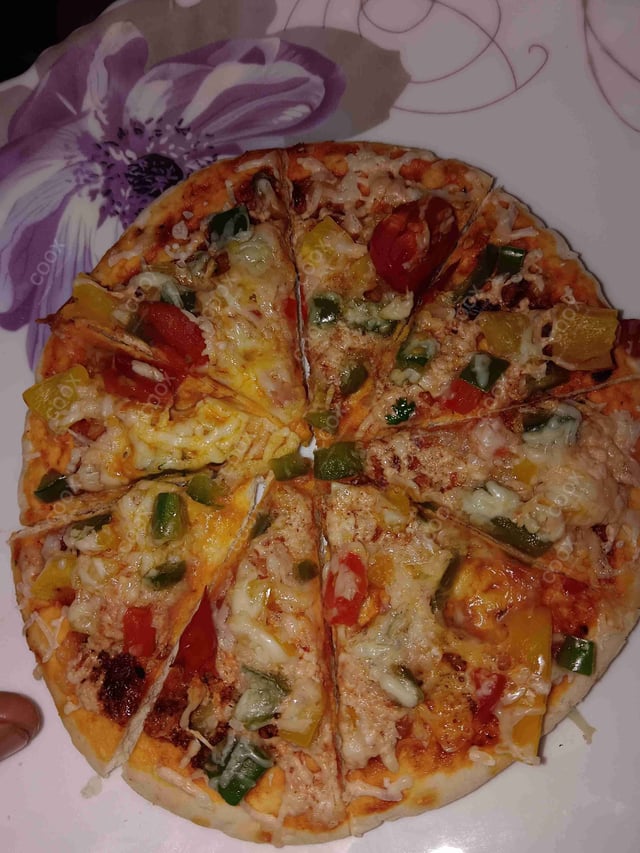 Delicious Margherita Pizza prepared by COOX