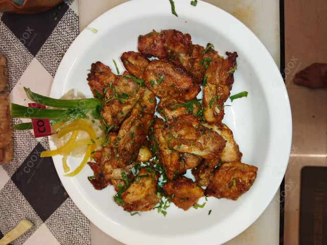 Delicious Chicken Tikka prepared by COOX