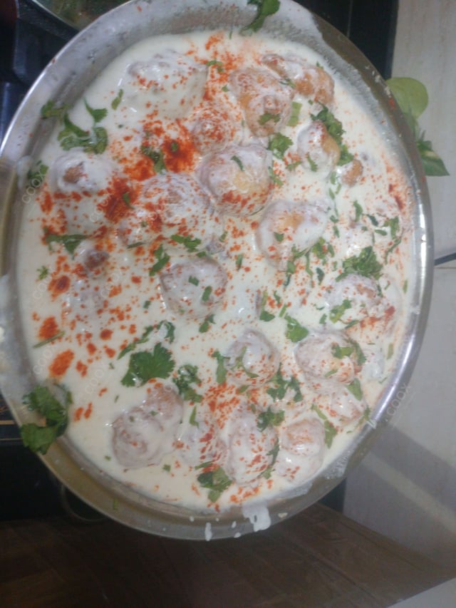 Delicious Dahi Bhalla prepared by COOX