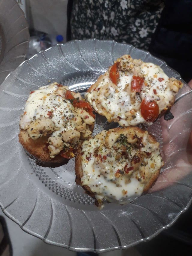 Delicious Chicken Bruschetta prepared by COOX