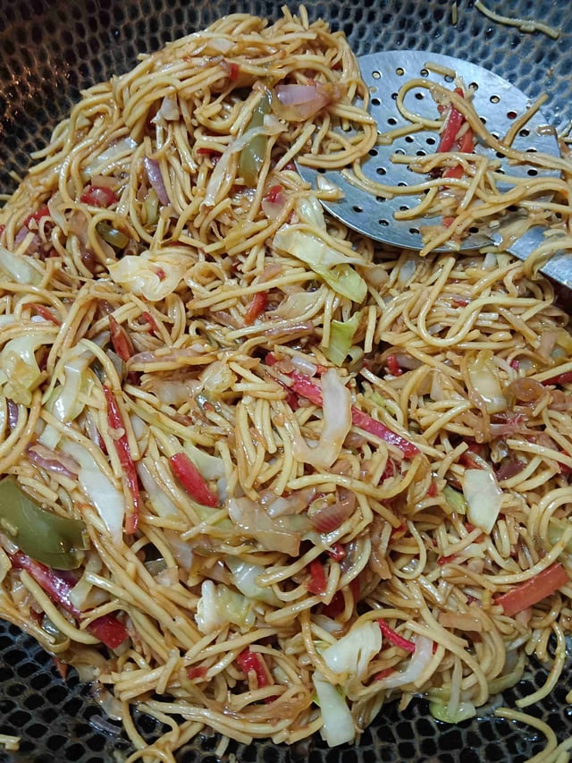 Delicious Veg Hakka Noodles prepared by COOX