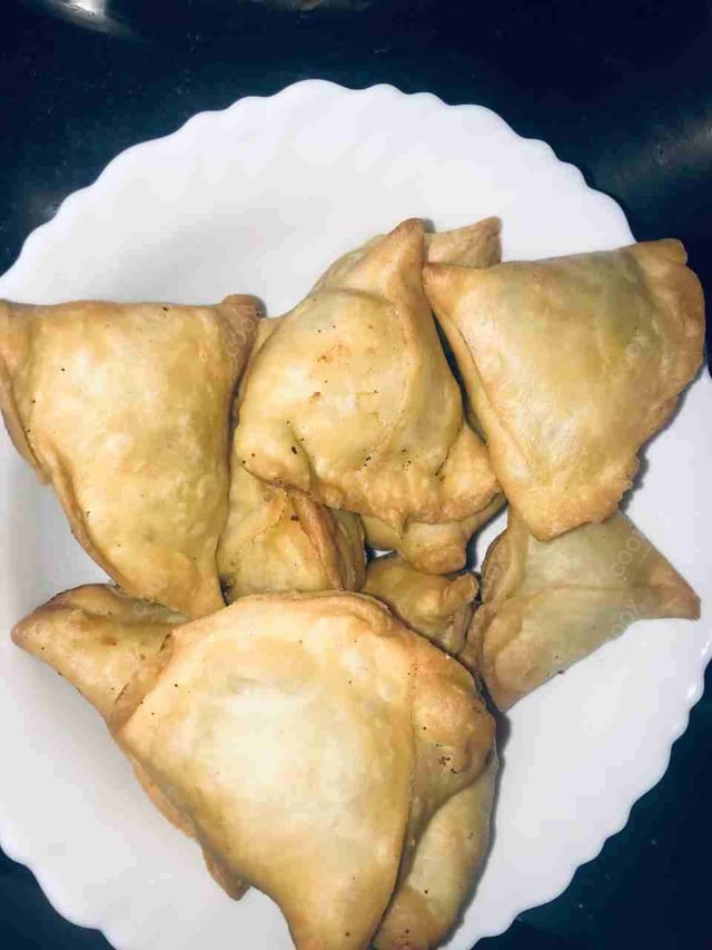 Delicious Mini Samosas prepared by COOX