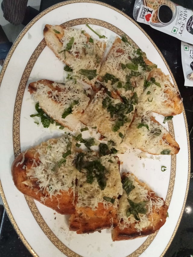 Delicious Garlic Bread with Cheese prepared by COOX