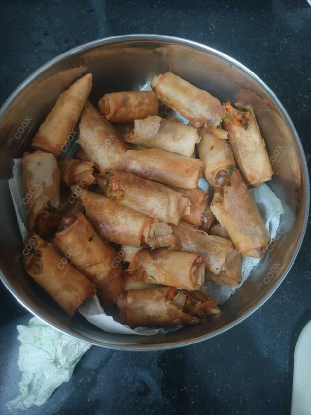 Delicious Veg Spring Rolls prepared by COOX