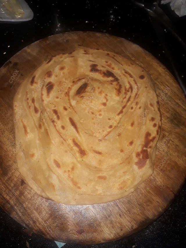 Delicious Lachha Parathas prepared by COOX