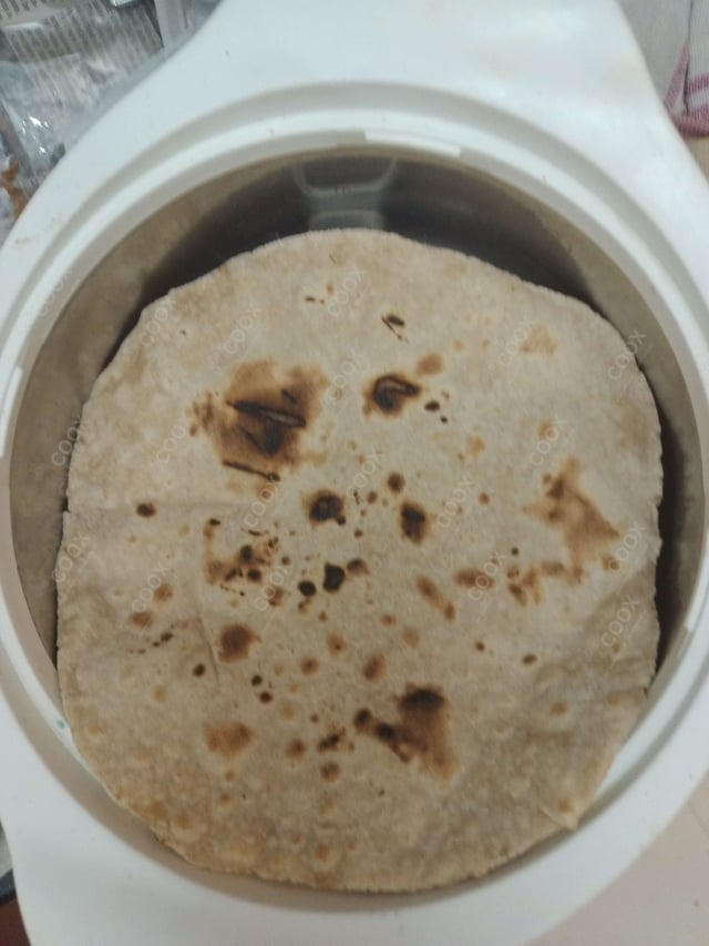 Delicious Tawa Rotis prepared by COOX