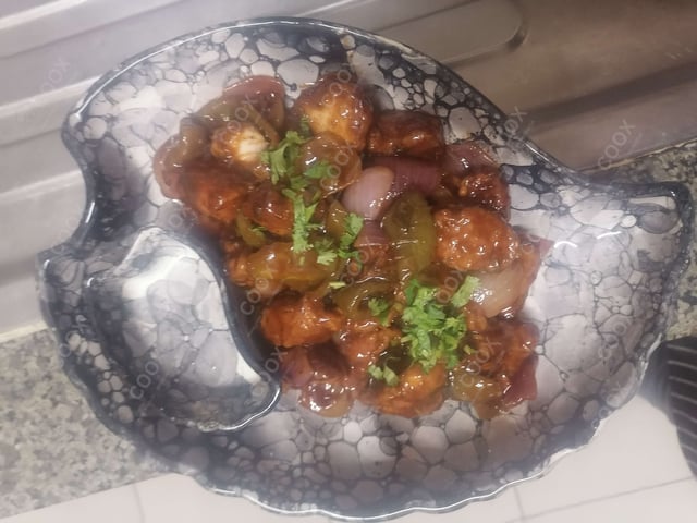 Delicious Chilli Chicken prepared by COOX