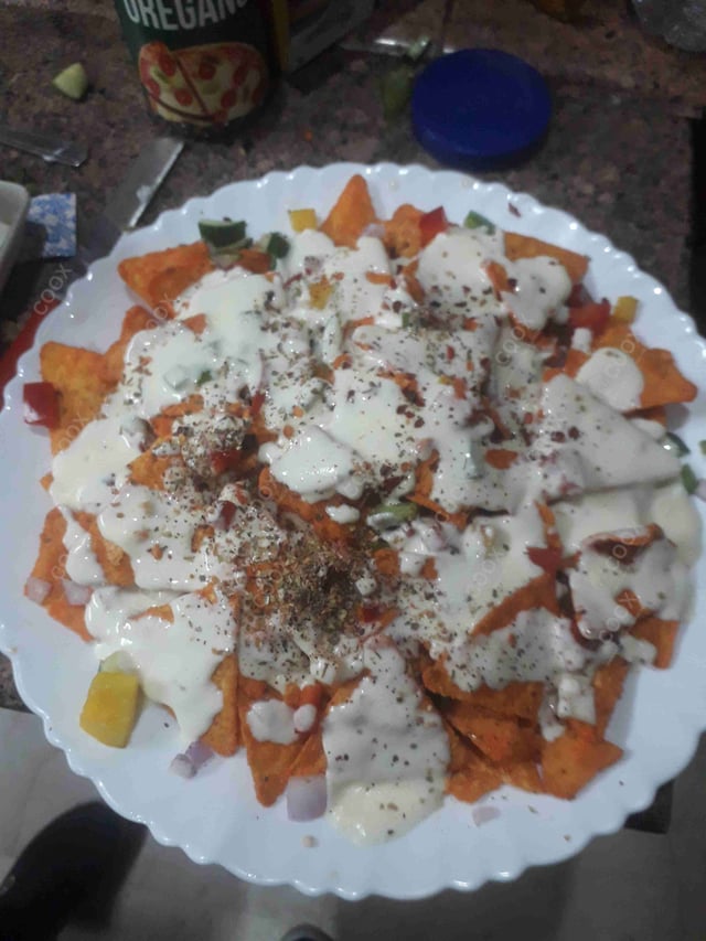 Delicious Cheese Nachos prepared by COOX