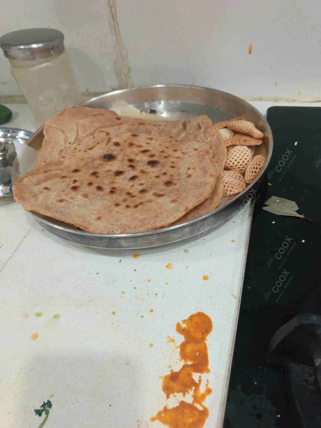 Delicious Tawa Rotis prepared by COOX