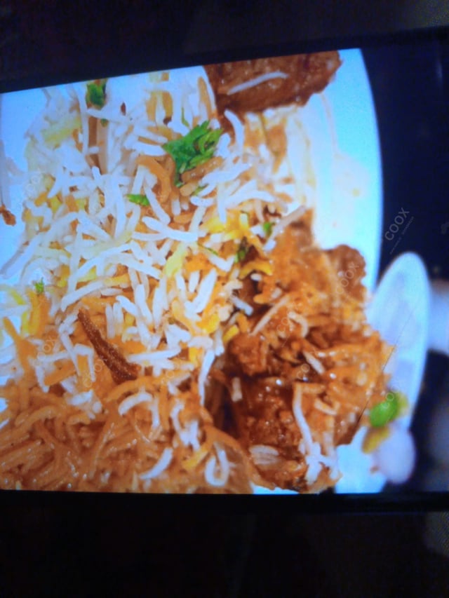 Delicious Chicken Biryani prepared by COOX