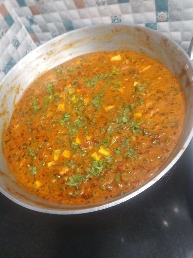 Delicious Matar Paneer prepared by COOX