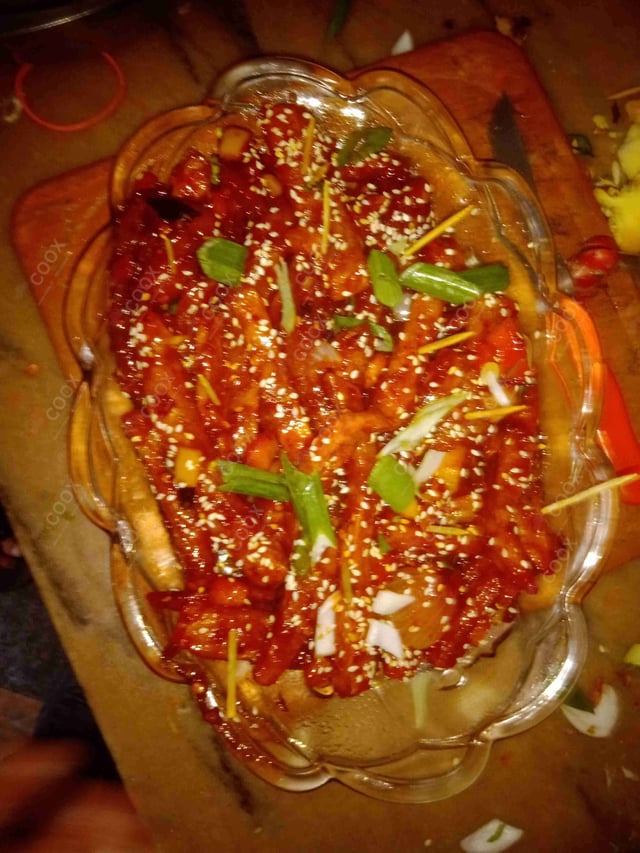 Delicious Honey Chilli Potato prepared by COOX