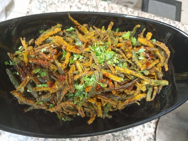 Delicious Kurkuri Bhindi prepared by COOX