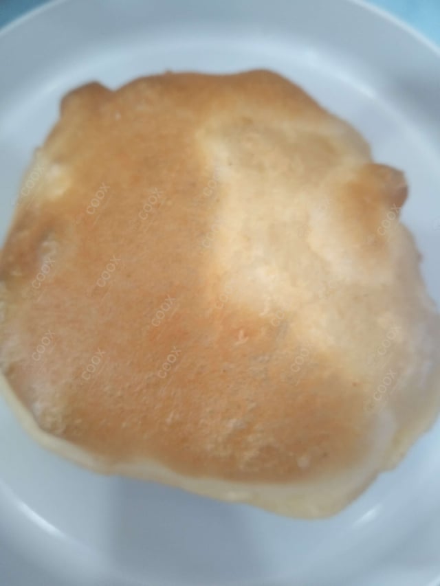 Delicious Bhature prepared by COOX