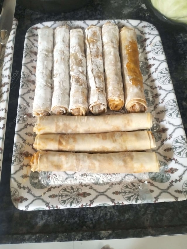 Delicious Veg Spring Rolls prepared by COOX