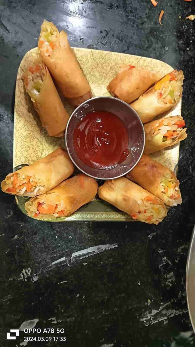 Delicious Veg Spring Rolls prepared by COOX