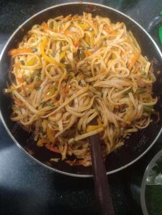 Delicious Chilli Garlic Noodles prepared by COOX