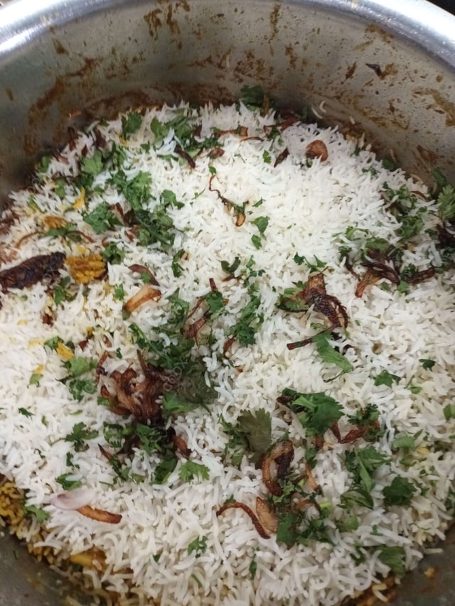 Delicious Veg Biryani prepared by COOX