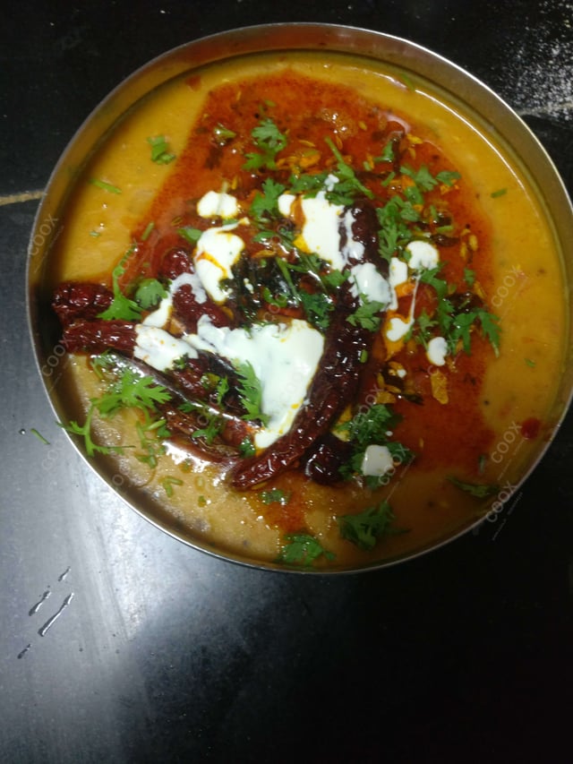 Delicious Dal Tadka prepared by COOX