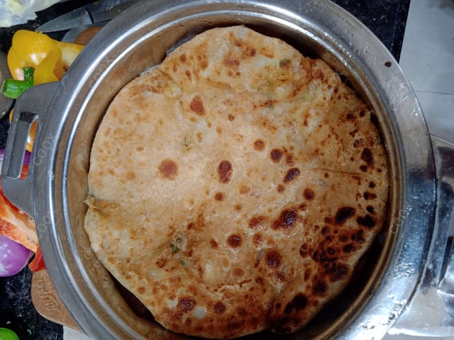 Delicious Stuffed Parathas prepared by COOX