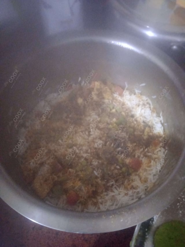 Delicious Veg Biryani prepared by COOX