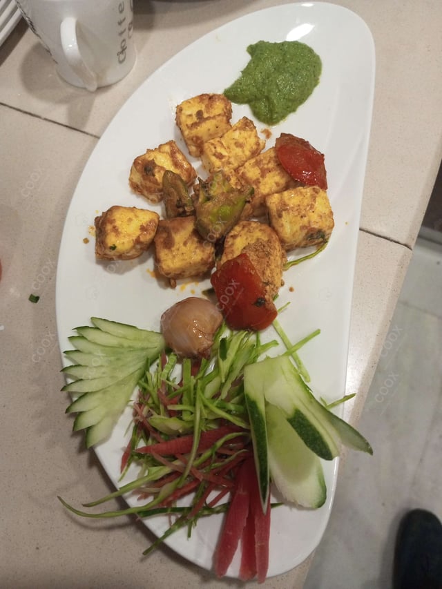 Delicious Paneer Tikka prepared by COOX