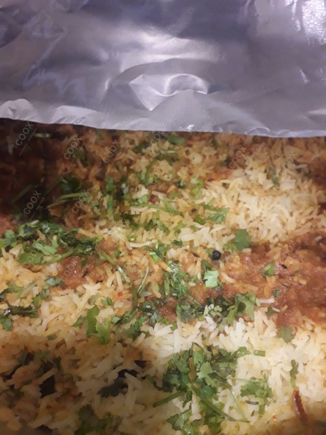 Delicious Chicken Biryani prepared by COOX