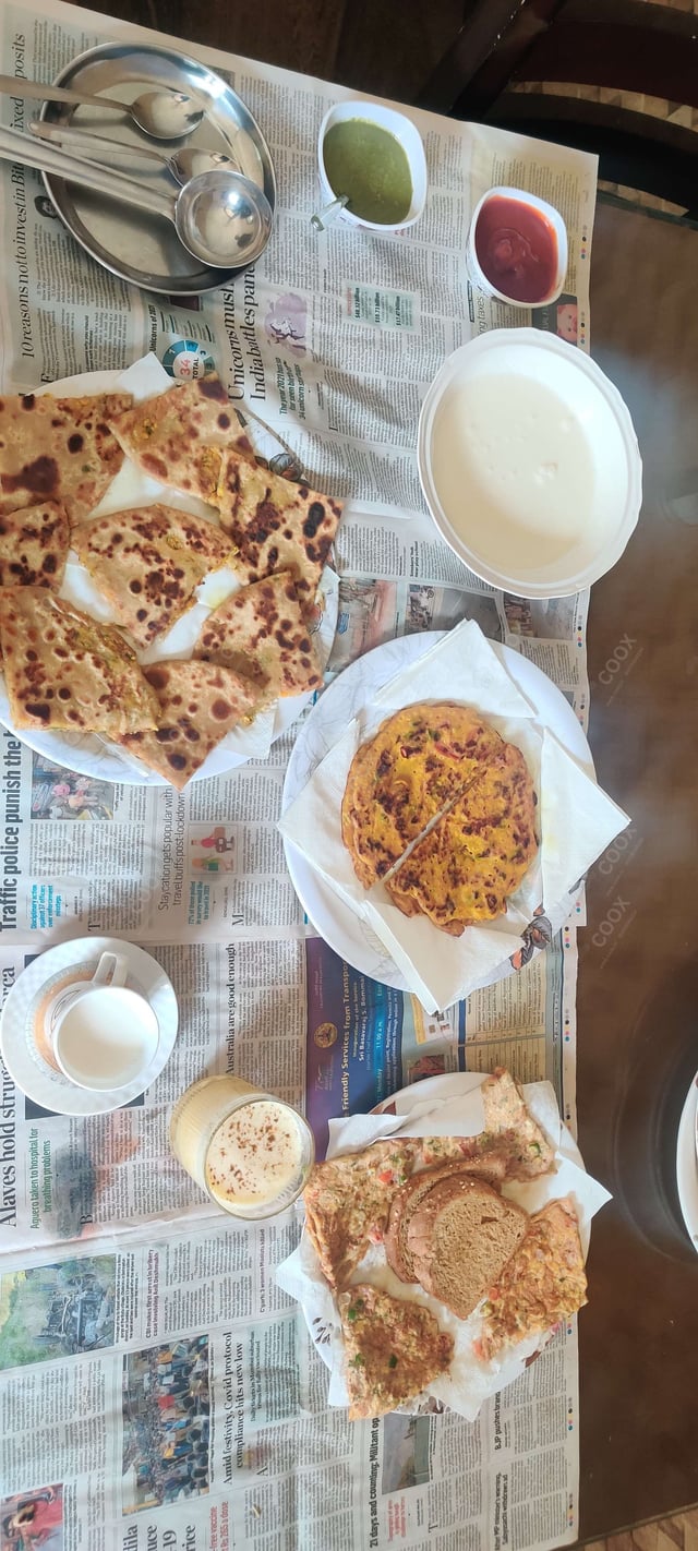 Delicious Stuffed Parathas prepared by COOX