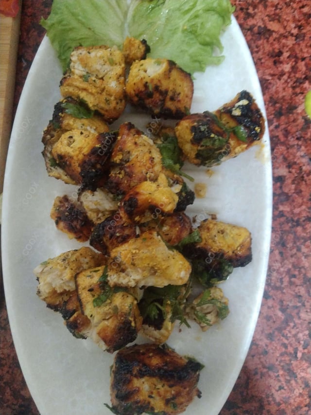 Delicious Fish Tikka prepared by COOX