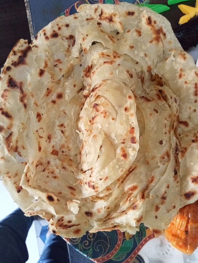 Delicious Lachha Paranthas prepared by COOX