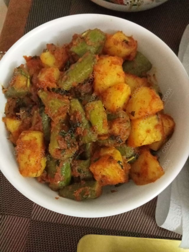 Delicious Aloo Parwal prepared by COOX