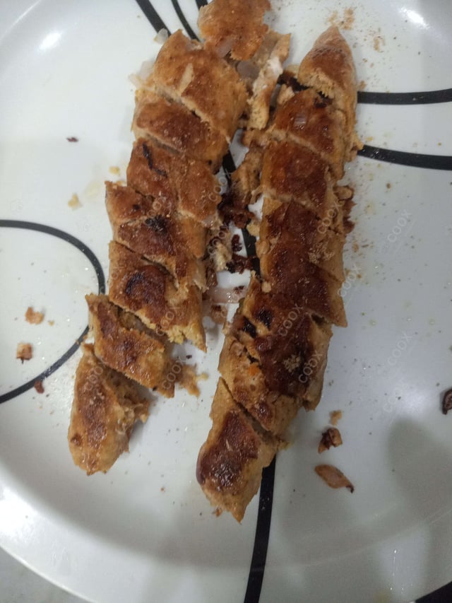 Delicious Chicken Seekh Kebab prepared by COOX