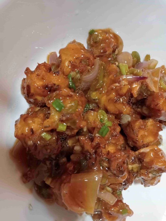 Delicious Veg Manchurian (Dry) prepared by COOX