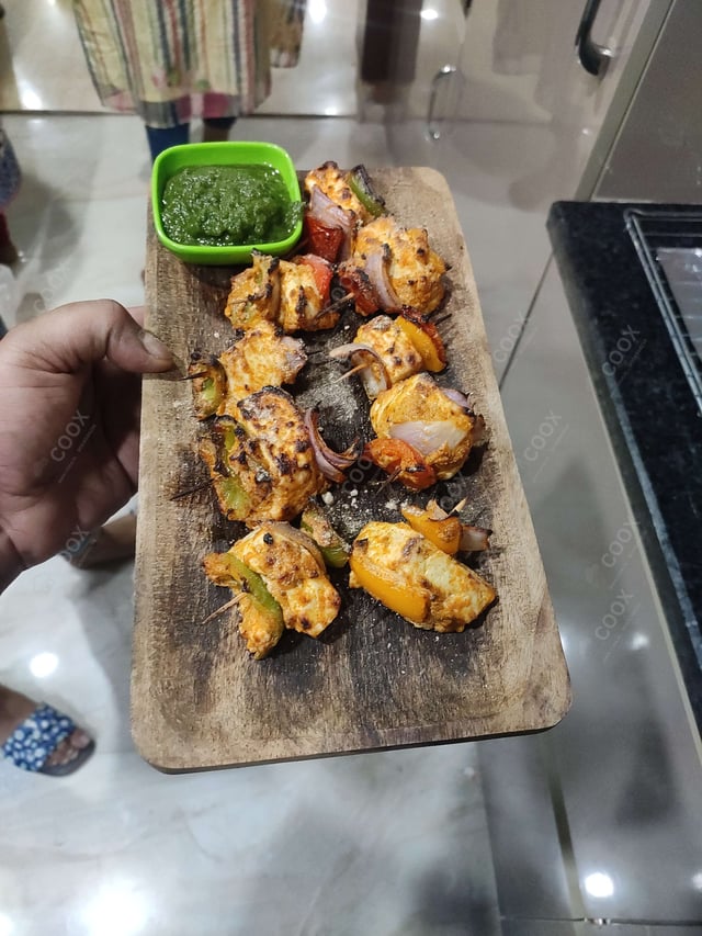 Delicious Paneer Tikka prepared by COOX