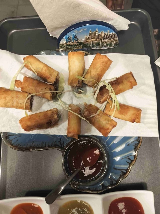 Delicious Veg Spring Rolls prepared by COOX